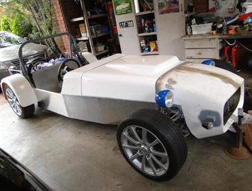 Aluminium and fibreglass bodywork approaching the final stages and just requiring minor fettling to improve fit and finish.